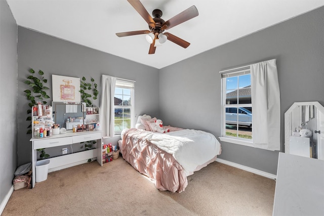 516 Celeste Dr, Robinson, TX 76706 - bedroom with light carpet and a ceiling fan