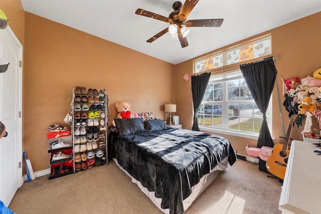 516 Celeste Dr, Robinson, TX 76706 - carpeted bedroom with ceiling fan and baseboards