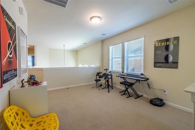 interior space featuring visible vents, carpet floors, and baseboards