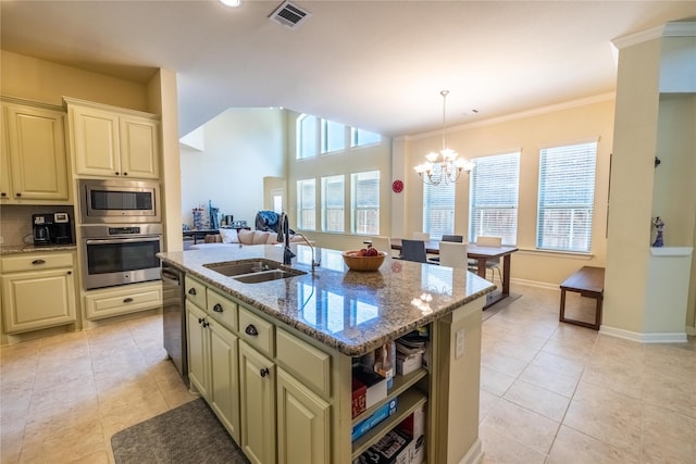 kitchen featuring a sink, light tile patterned flooring, visible vents, and appliances with stainless steel finishes