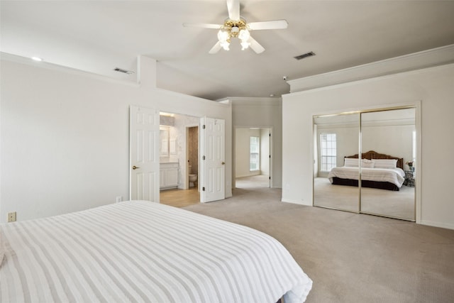 711 Parkway Blvd, Coppell, TX 75019 - bedroom with visible vents, crown molding, a closet, light carpet, and baseboards