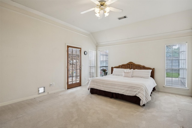 bedroom with baseboards, multiple windows, light carpet, and visible vents