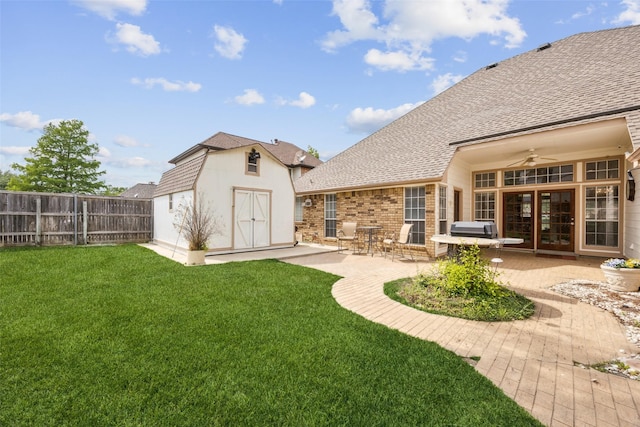 711 Parkway Blvd, Coppell, TX 75019 - rear view of property with a chimney, a gate, brick siding, a yard, and a shingled roof
