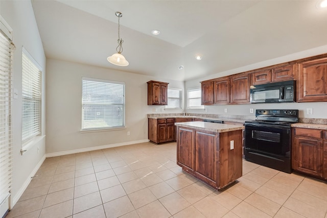 kitchen with black appliances, light tile patterned flooring, vaulted ceiling, and light countertops