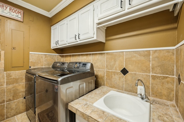 403 Hilltop, Trophy Club, TX 76262 - laundry room with tile walls, ornamental molding, electric panel, a sink, and washer and clothes dryer