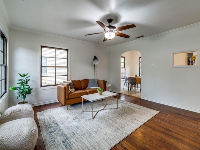 1727 Melbourne Ave, Dallas, TX 75224 - living area featuring baseboards, arched walkways, ceiling fan, and hardwood / wood-style floors