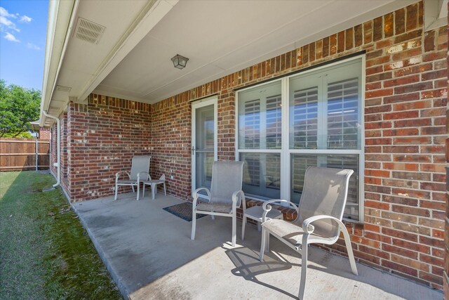 view of patio / terrace with fence