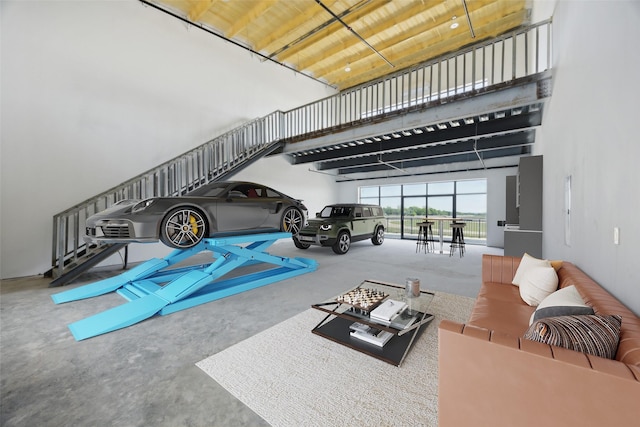 living room with a high ceiling