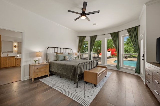 bedroom featuring wood finished floors, connected bathroom, access to outside, visible vents, and crown molding