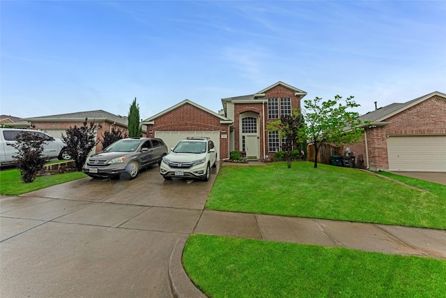 traditional home with driveway, a front lawn, an attached garage, and brick siding