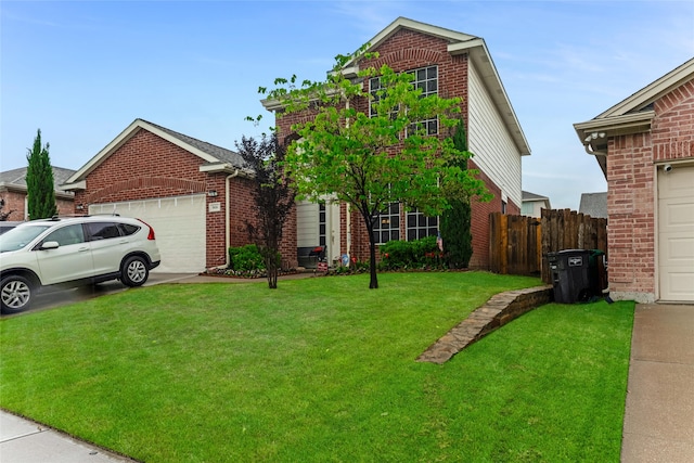 traditional-style home with a front yard, brick siding, concrete driveway, an attached garage, and fence