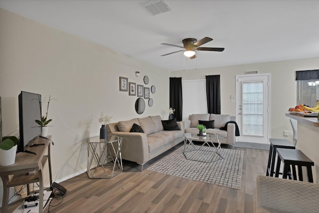 5652 Giddyup Ln, Fort Worth, TX 76179 - living room featuring a ceiling fan, visible vents, wood finished floors, and baseboards