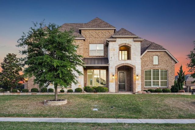 505 Eloise Dr, Heath, TX 75032 - french provincial home featuring stone siding, a yard, a shingled roof, and brick siding