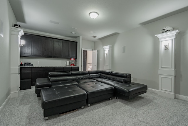 505 Eloise Dr, Heath, TX 75032 - home theater with wet bar, baseboards, light carpet, and ornate columns