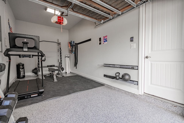 505 Eloise Dr, Heath, TX 75032 - workout area featuring a garage and baseboards
