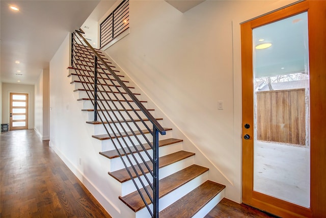 6702 Tyree St, Dallas, TX 75209 - stairs with wood finished floors, baseboards, and recessed lighting