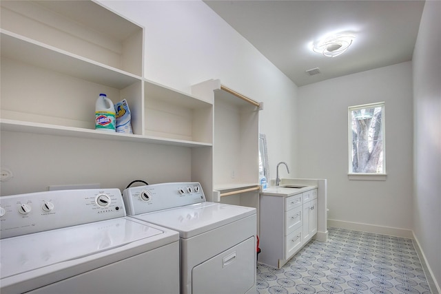 6702 Tyree St, Dallas, TX 75209 - laundry room featuring separate washer and dryer, baseboards, and light floors