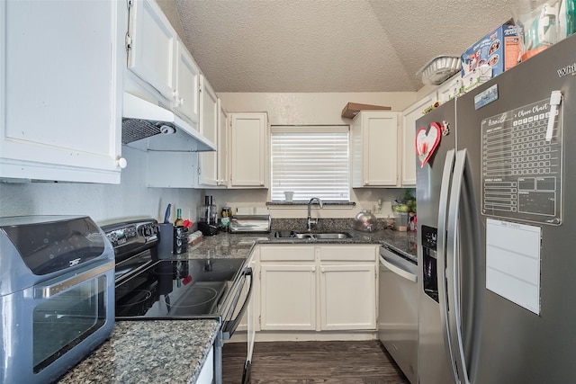kitchen featuring dark wood-style flooring, a sink, stainless steel appliances, white cabinetry, and under cabinet range hood