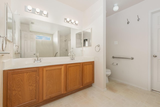 525 Butch Cassidy Dr, Anna, TX 75409 - bathroom with toilet, double vanity, a shower, and baseboards