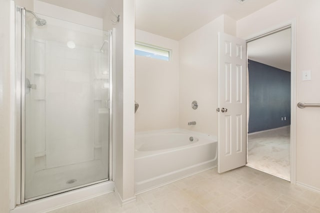 525 Butch Cassidy Dr, Anna, TX 75409 - bathroom featuring a shower stall, a bath, and baseboards