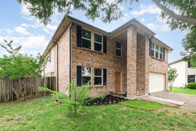 525 Butch Cassidy Dr, Anna, TX 75409 - traditional-style house with an attached garage, driveway, and brick siding