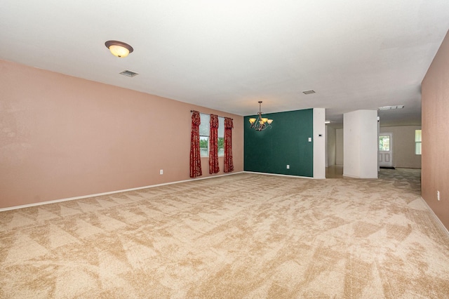 525 Butch Cassidy Dr, Anna, TX 75409 - carpeted empty room featuring a chandelier and baseboards