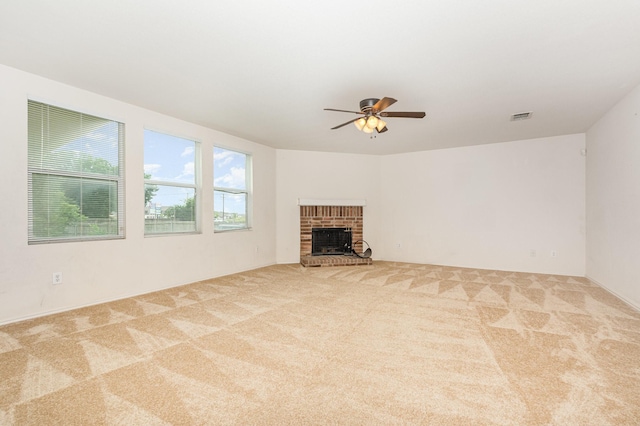 525 Butch Cassidy Dr, Anna, TX 75409 - unfurnished living room featuring carpet flooring, ceiling fan, and a brick fireplace
