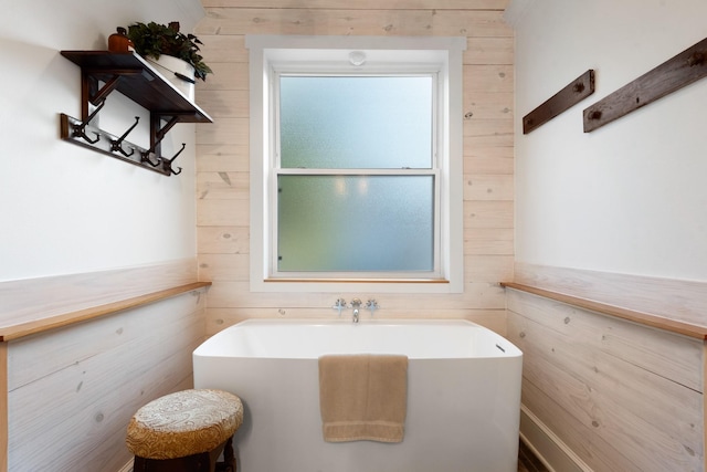 334 Pleasant Acres Rd, Rockwall, TX 75087 - bathroom with a freestanding bath and wooden walls