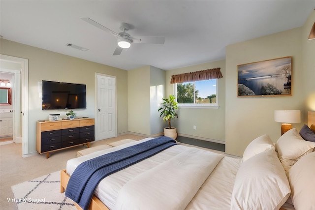334 Pleasant Acres Rd, Rockwall, TX 75087 - bedroom featuring connected bathroom, light colored carpet, visible vents, ceiling fan, and baseboards