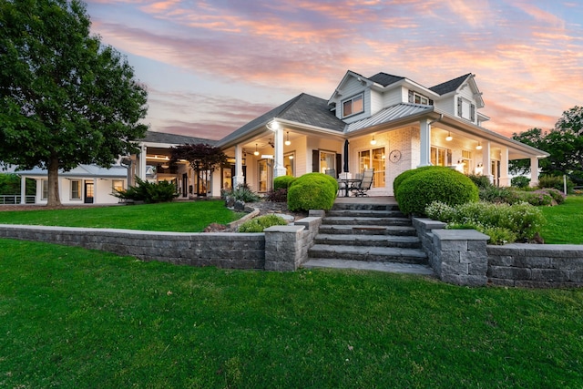334 Pleasant Acres Rd, Rockwall, TX 75087 - view of front facade featuring a standing seam roof, a porch, ceiling fan, and a front yard
