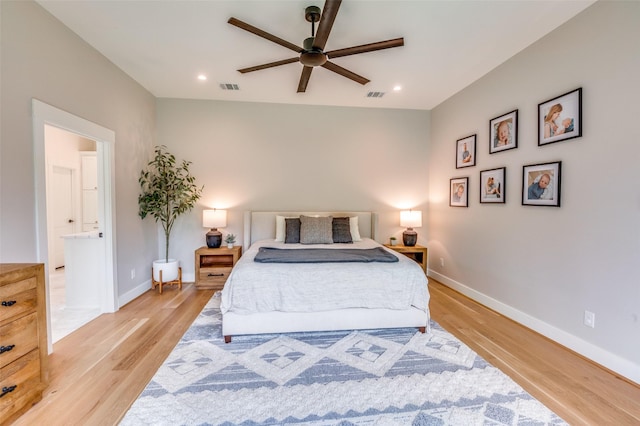 bedroom featuring baseboards, visible vents, light wood-type flooring, and recessed lighting