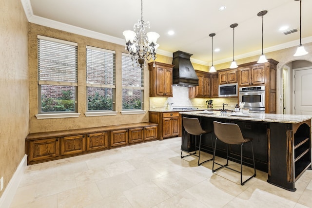 1233 Deer Lake Dr, Frisco, TX 75036 - kitchen with plenty of natural light, appliances with stainless steel finishes, visible vents, and custom range hood