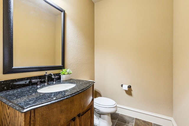 1233 Deer Lake Dr, Frisco, TX 75036 - bathroom featuring toilet, baseboards, vanity, and tile patterned flooring