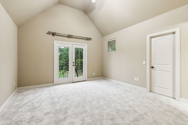 1233 Deer Lake Dr, Frisco, TX 75036 - carpeted spare room featuring lofted ceiling, baseboards, and french doors