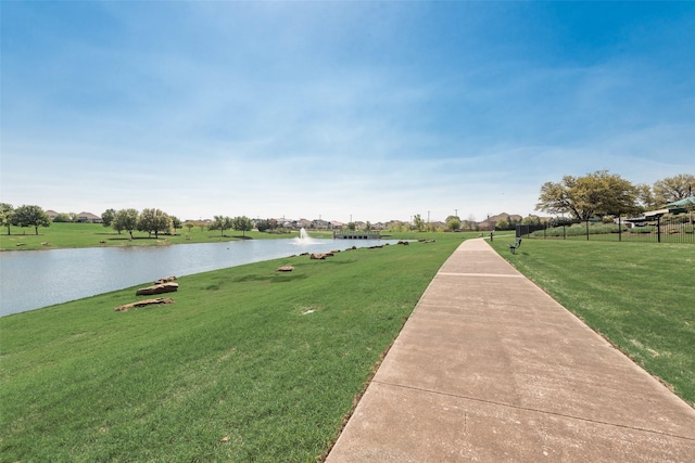 1233 Deer Lake Dr, Frisco, TX 75036 - surrounding community with a water view and a lawn