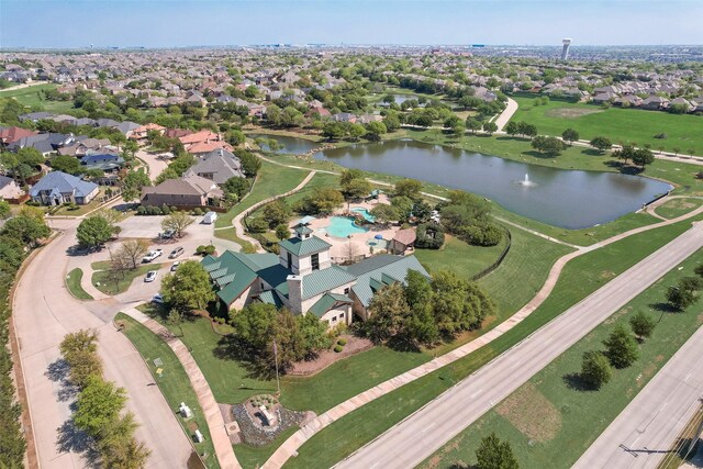 1233 Deer Lake Dr, Frisco, TX 75036 - aerial view of property and surrounding area featuring a large body of water, a pool, and nearby suburban area