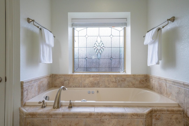 4703 El Brevo Ct, Arlington, TX 76017 - bathroom featuring a garden tub and plenty of natural light