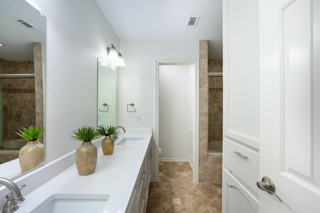 4703 El Brevo Ct, Arlington, TX 76017 - full bathroom featuring a tub to relax in, visible vents, a tile shower, and a sink