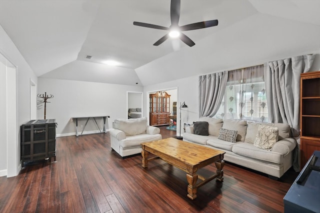 living room with wood-type flooring, a ceiling fan, visible vents, baseboards, and lofted ceiling