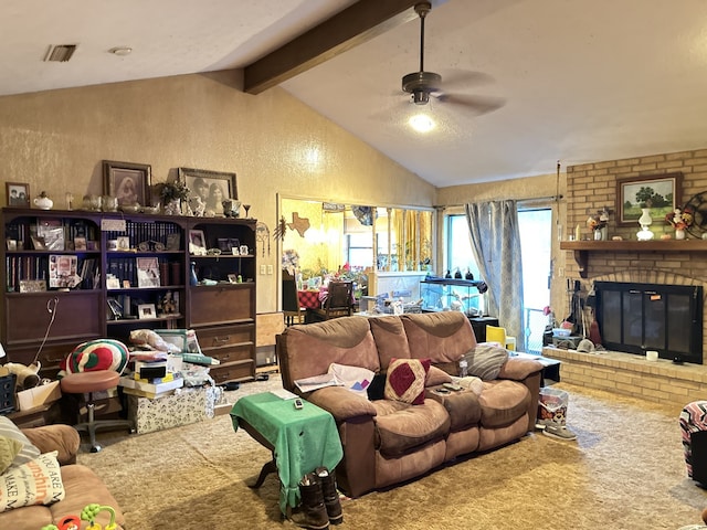 carpeted living area with a fireplace, a textured wall, a ceiling fan, and vaulted ceiling