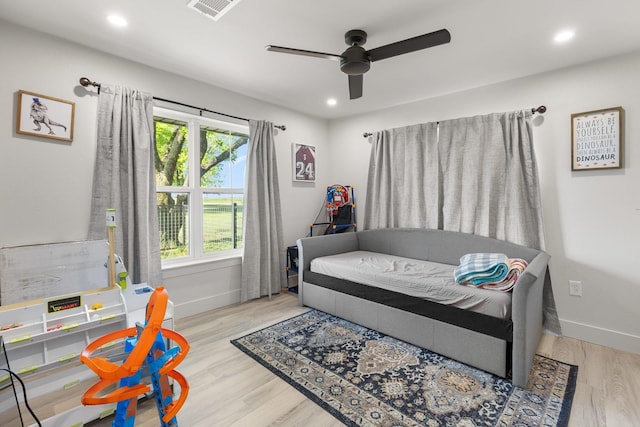 bedroom featuring visible vents, ceiling fan, baseboards, recessed lighting, and wood finished floors