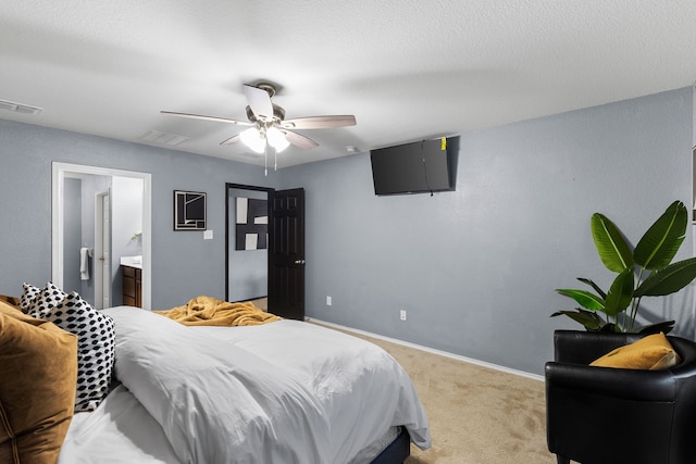 bedroom with light colored carpet, visible vents, a ceiling fan, and baseboards