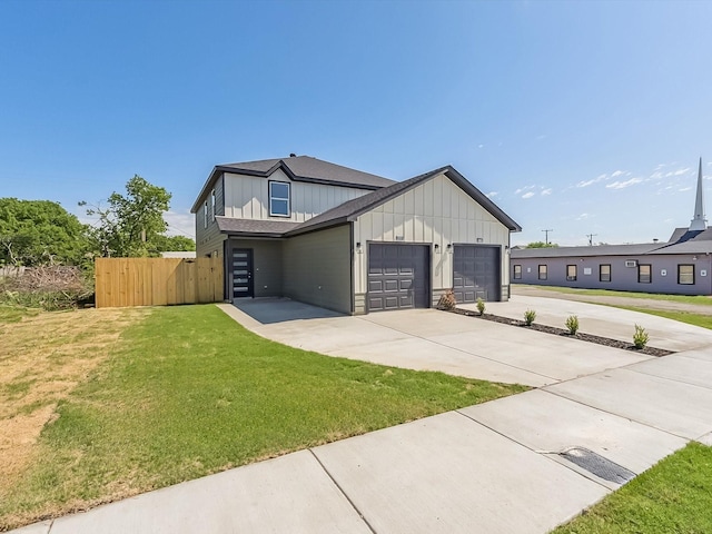 8008 W Elizabeth Ln, Fort Worth, TX 76116 - view of front of home featuring concrete driveway, board and batten siding, a front yard, an attached garage, and fence