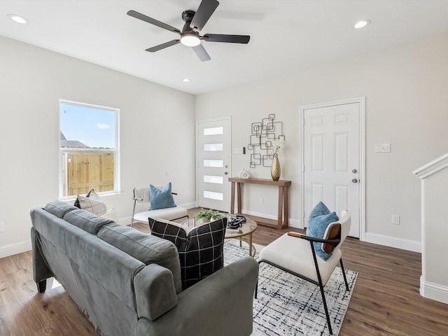 8008 W Elizabeth Ln, Fort Worth, TX 76116 - living room featuring ceiling fan, a wealth of natural light, wood finished floors, and baseboards