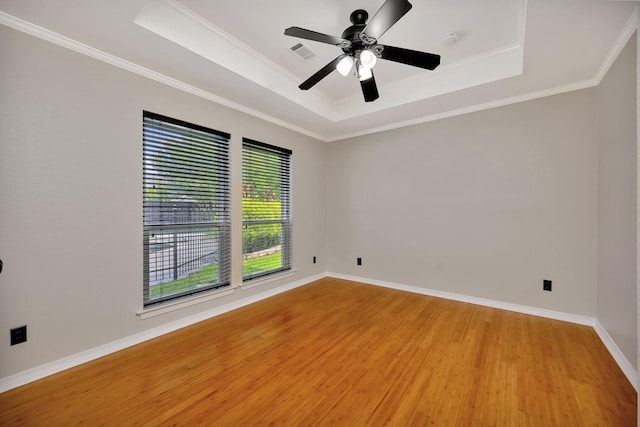 201 Hancock Ct, Colleyville, TX 76034 - unfurnished room with a raised ceiling, light wood-type flooring, ceiling fan, ornamental molding, and baseboards