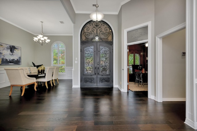 201 Hancock Ct, Colleyville, TX 76034 - entryway with french doors, a chandelier, healthy amount of natural light, dark wood finished floors, and ornamental molding