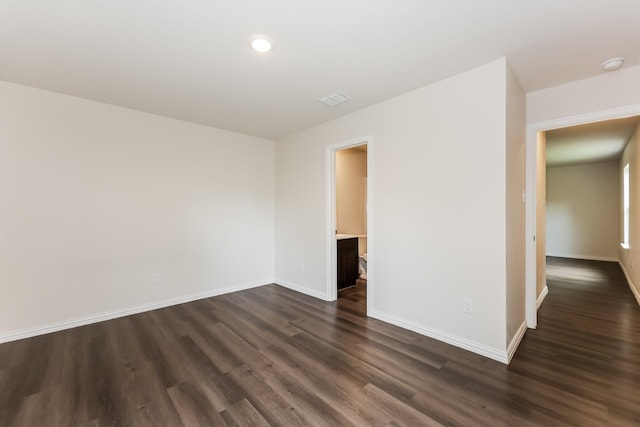 932 Dawson St, Waco, TX 76704 - spare room featuring baseboards, visible vents, dark wood-style flooring, and recessed lighting
