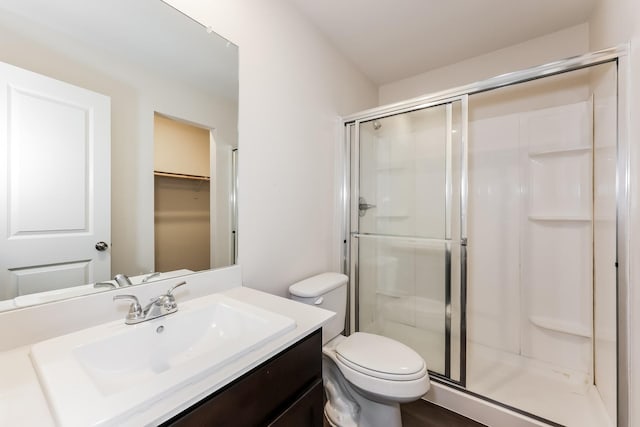 932 Dawson St, Waco, TX 76704 - bathroom featuring vanity, toilet, and a stall shower