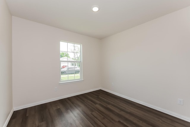 932 Dawson St, Waco, TX 76704 - spare room featuring recessed lighting, dark wood finished floors, and baseboards