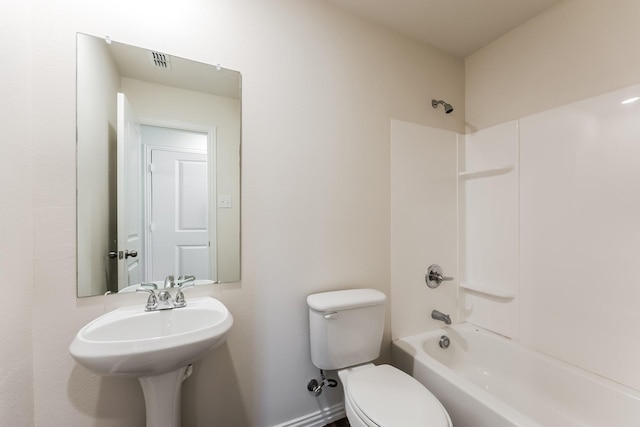 932 Dawson St, Waco, TX 76704 - bathroom with visible vents, toilet,  shower combination, and a sink